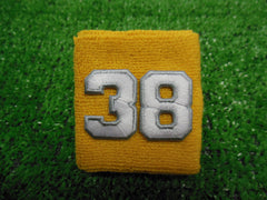 Gold  -  Wristbands with White Embroidered Numbers