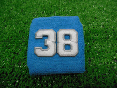 Columbia Blue  -  Wristbands with White Embroidered Numbers