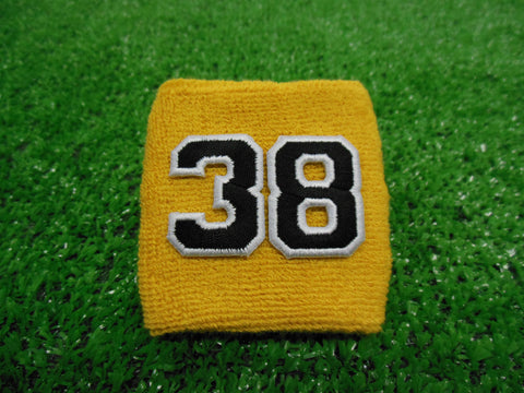 Gold  -  Wristbands with Black Embroidered Numbers