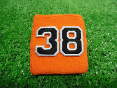 Orange  -  Wristbands with Black Embroidered Numbers